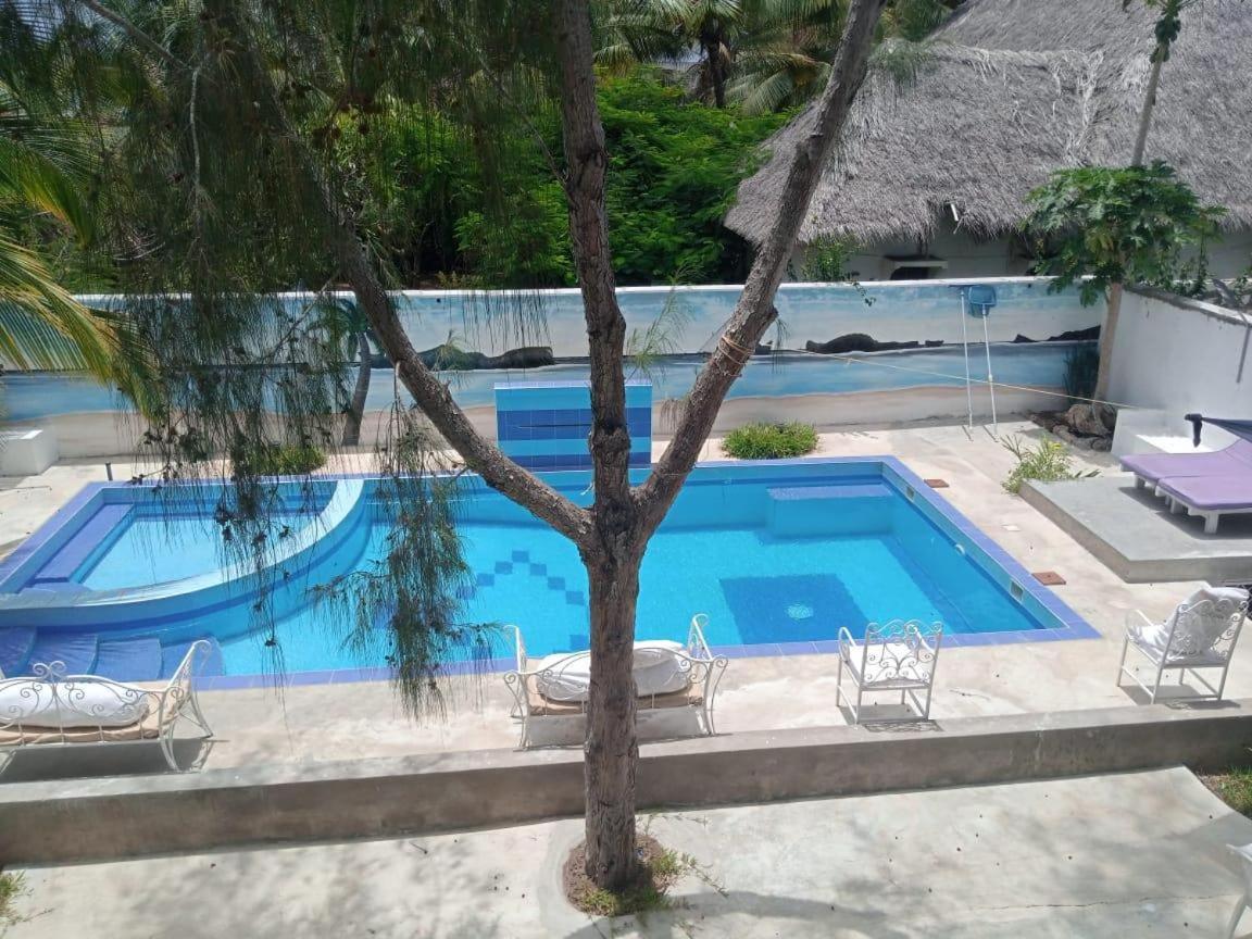 Nyumba Tulivu Apartment Ватаму Екстериор снимка